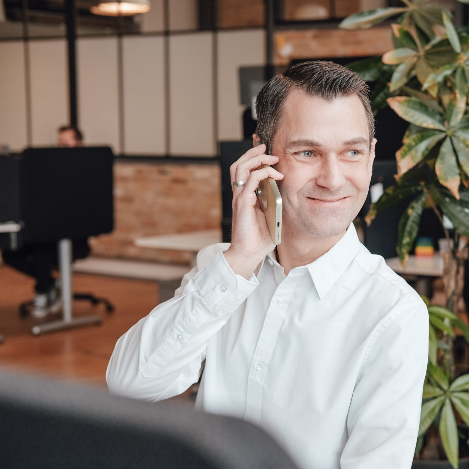 A Ubivox employee on the phone in the office